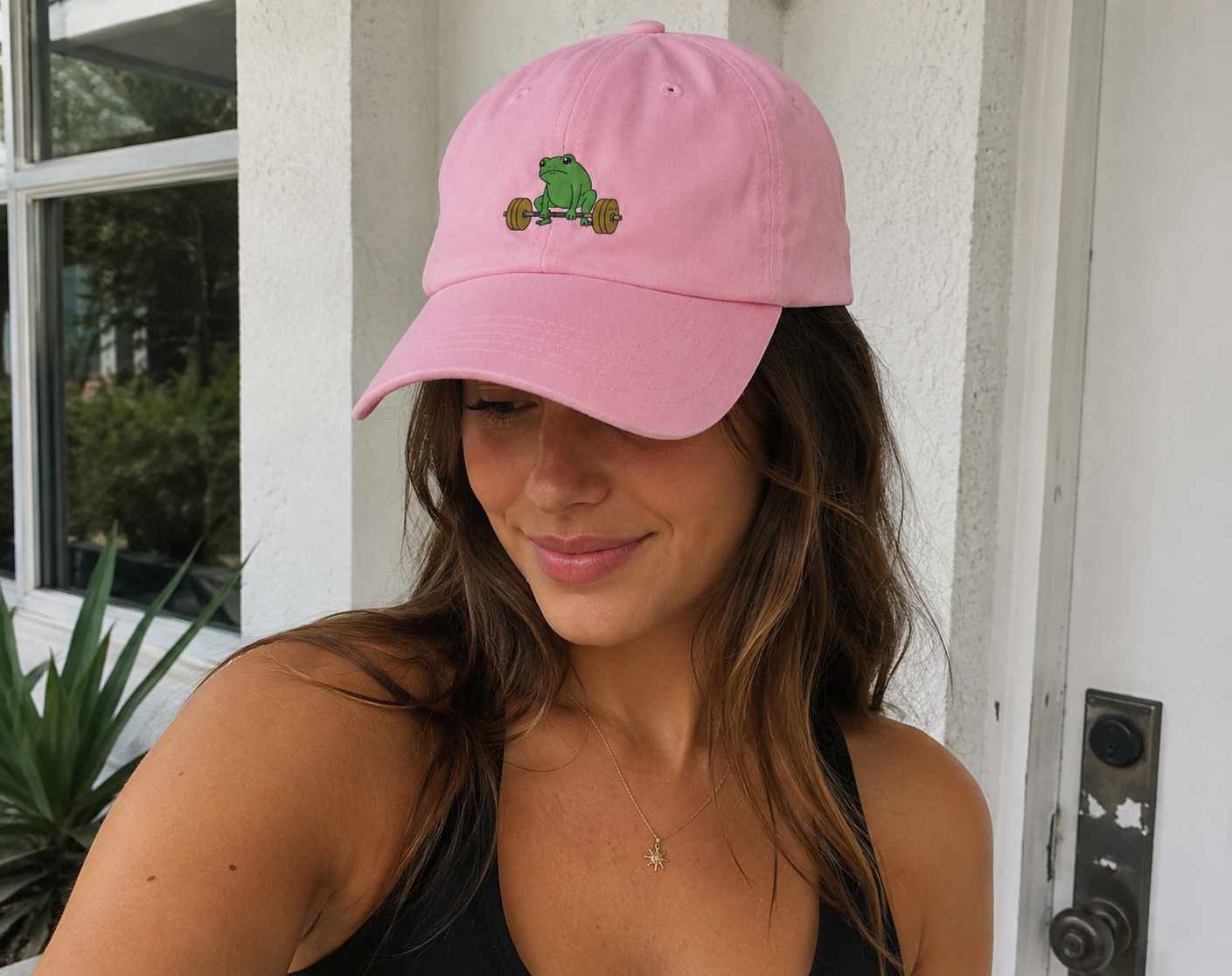 Global Fitness Co. pink women’s dad hat featuring embroidered frog fitness graphic